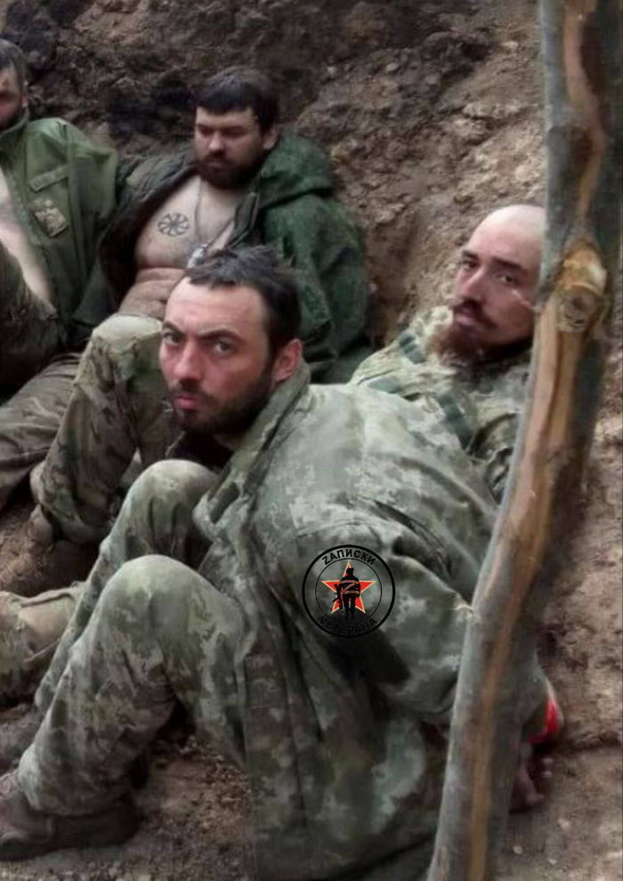 Amongst the captured Ukrainians soldiers sit a few familiar 