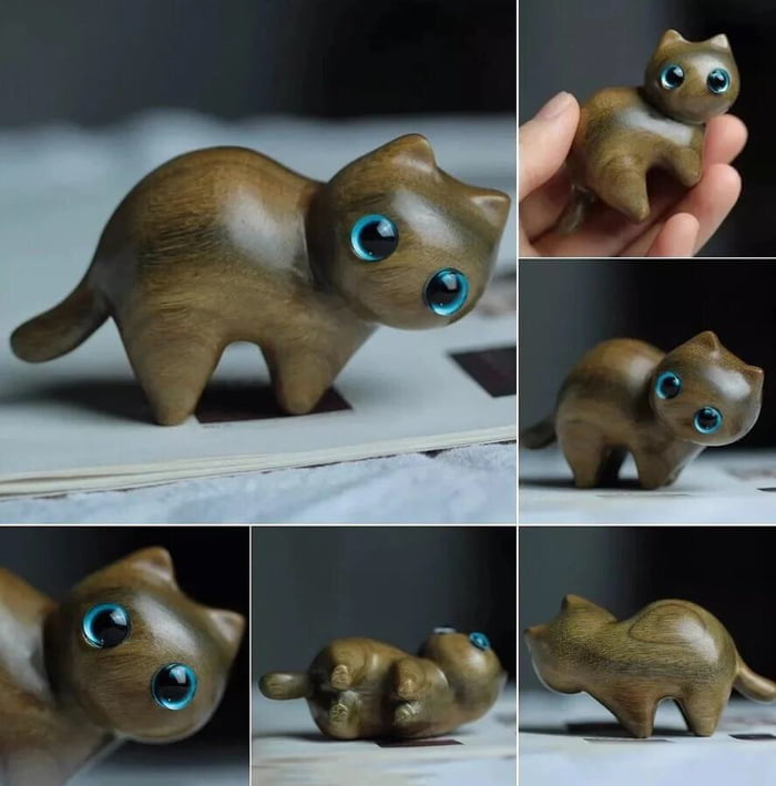 This is a hand carved cat，its so cute