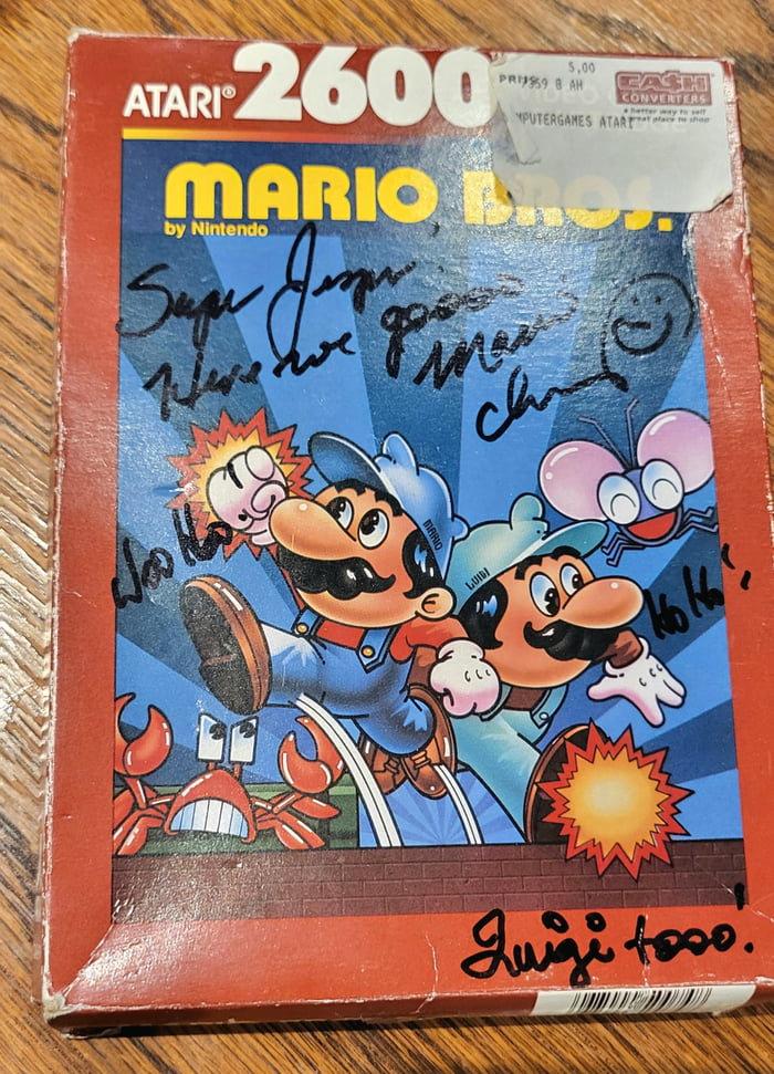 My old Atari Mario game signed by Charles Martinet himself