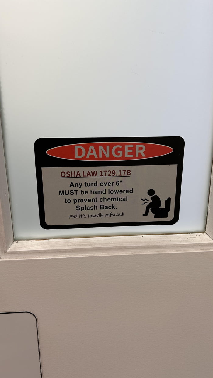 This funny sticker on the door to the workshop bathroom