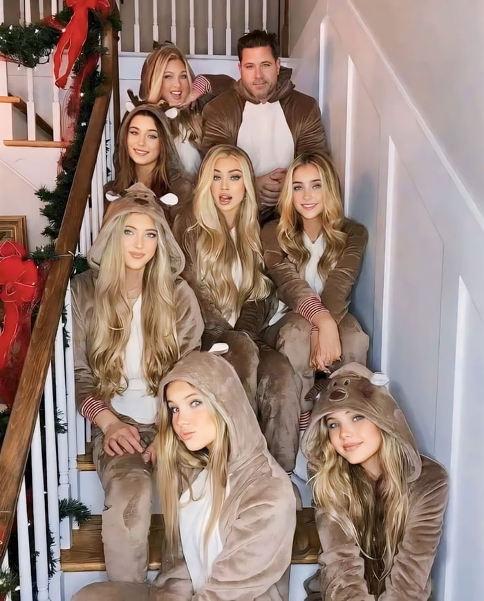 Just a regular dad with his 6 daughters. Image