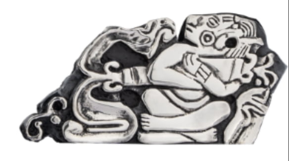 Is this mayan relief showing a man... holding a rocket? Link Image