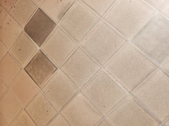 What makes bathroom tiles get like this?