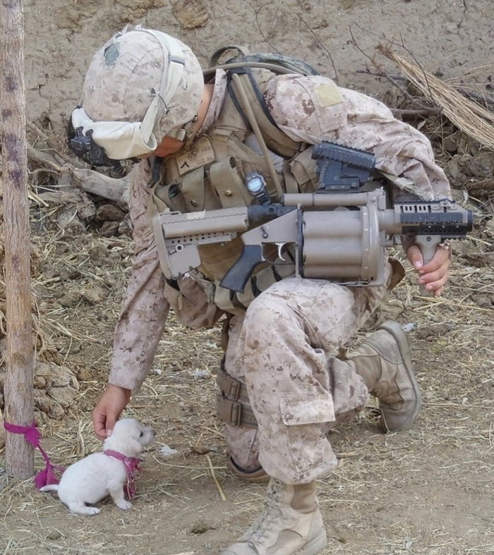 Rare photo of a soldier preparing to reload his pup-launcher