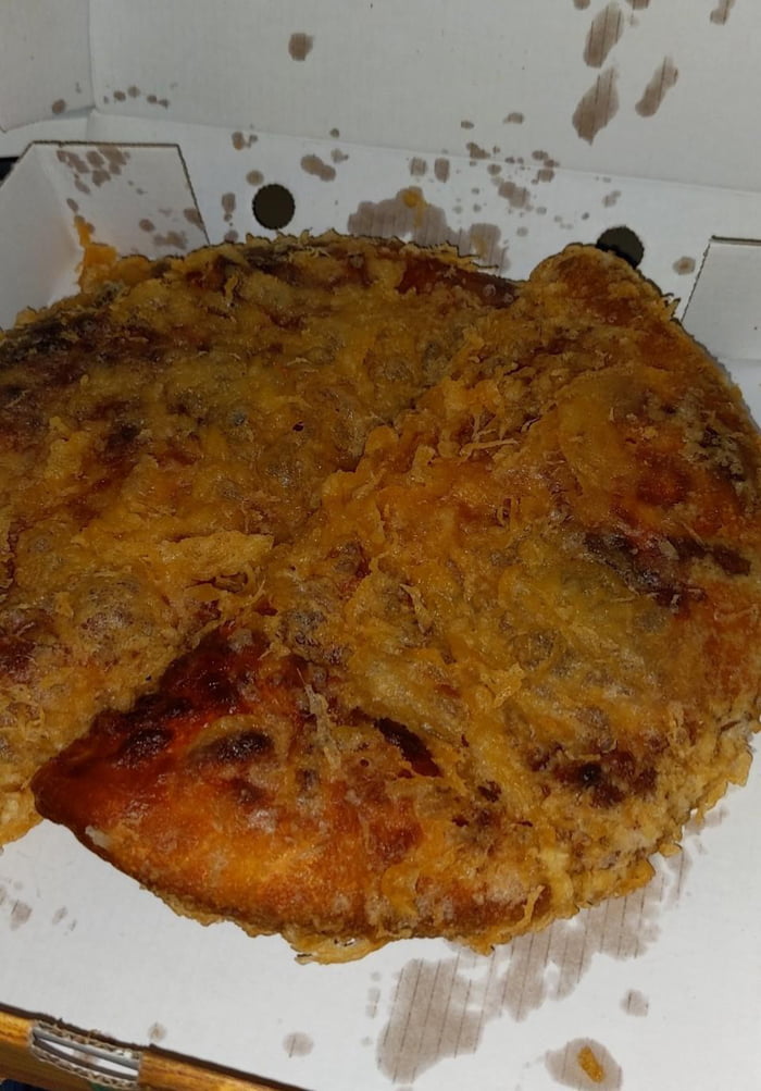 Deep-fried pizza. Pretty common in Scotland.