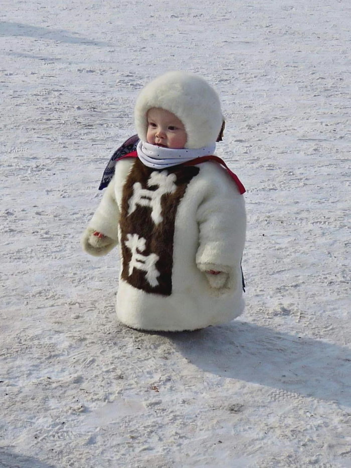 How a Mongolian dresses their child for the cold Image