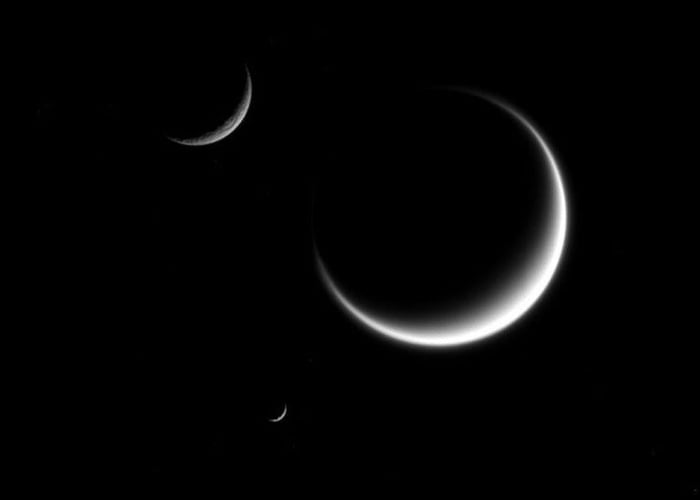 Saturn's moons Rhea, Titan, and Mimas formed a triple cresce