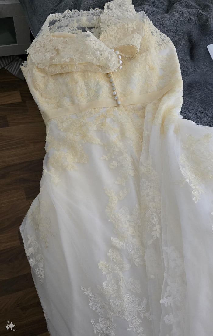 Motor oil stain on wedding dress. 2 weeks pre wedding. Help?