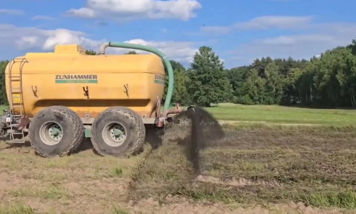 Polish farmers have started pouring pig slurry over an area 